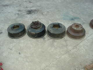 4 AA Drums Cast Iron &amp; Steel. The 2 On The Left Are Steel And The 2 On The Right Are Cast Iron.