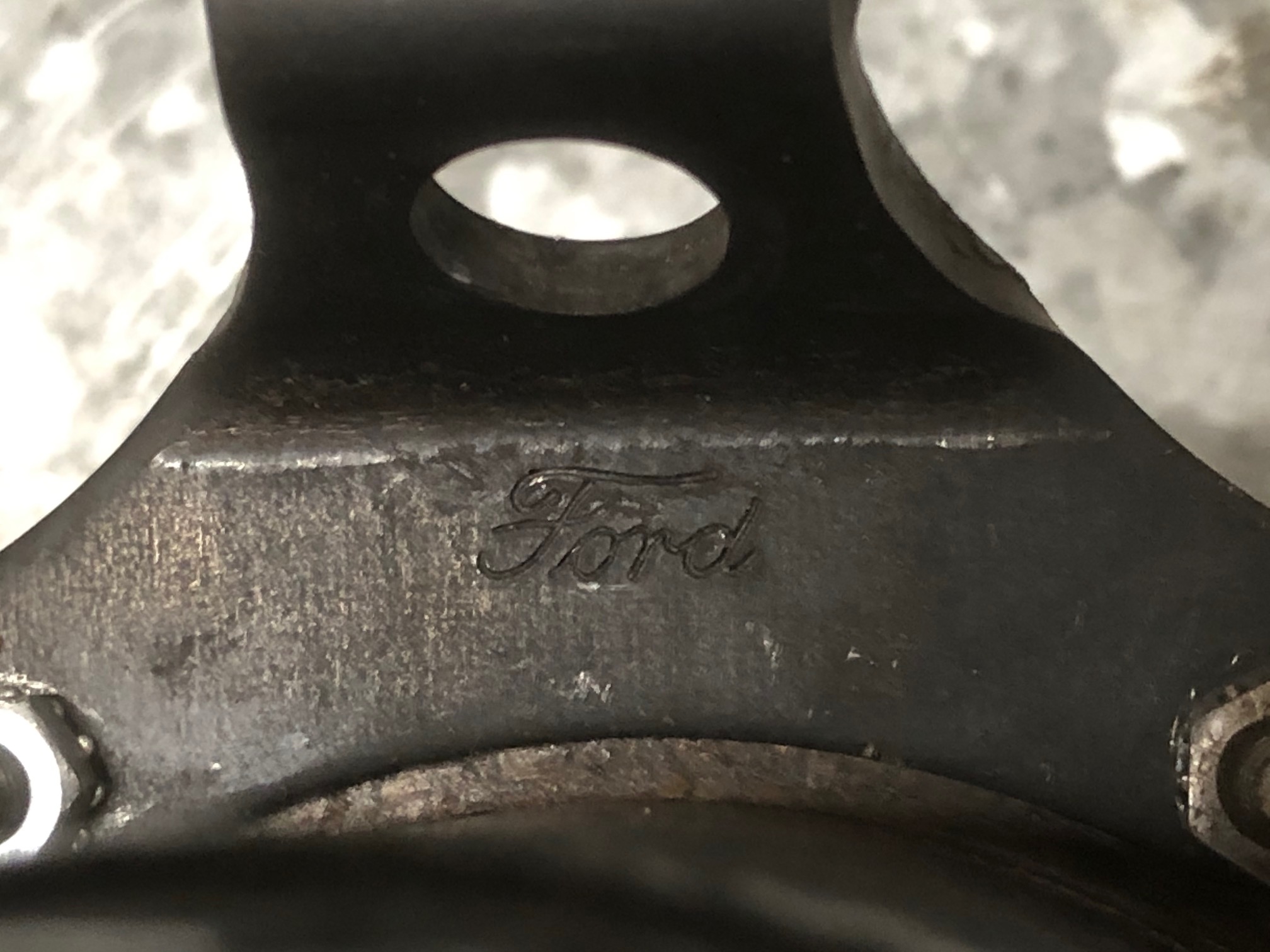 Bracket stamped Ford